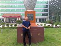 at the national table tennis training centre in shijiazhuang, china, standing in front of the iran cup.2009