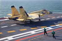 su-33 landing on the deck of admiral